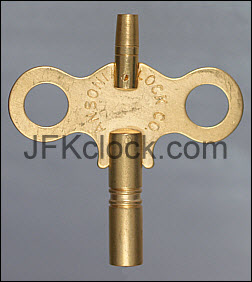 A brass, wing-style, double-ended Ansonia key