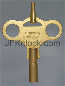A brass, wing-style, double-ended E.N. Welch key